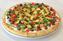 Taco pizza with white cheese sauce