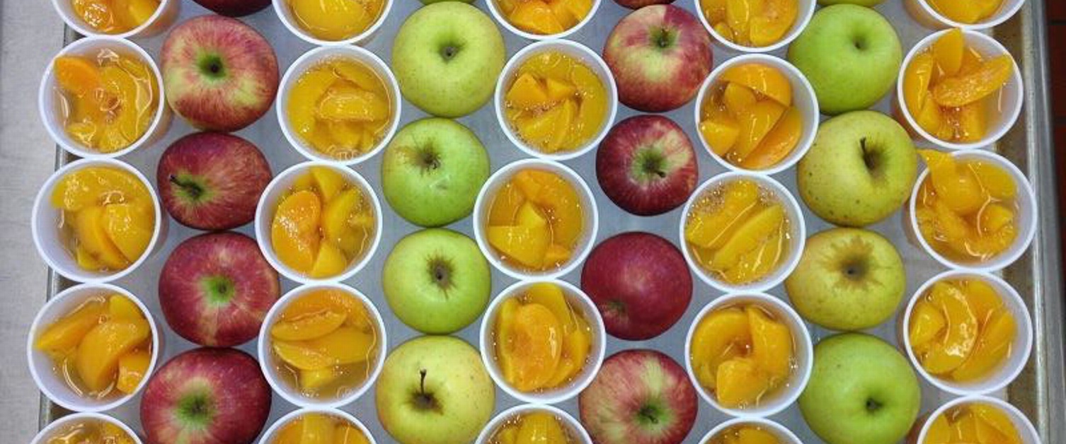 Tray of apples, peaches, and pears